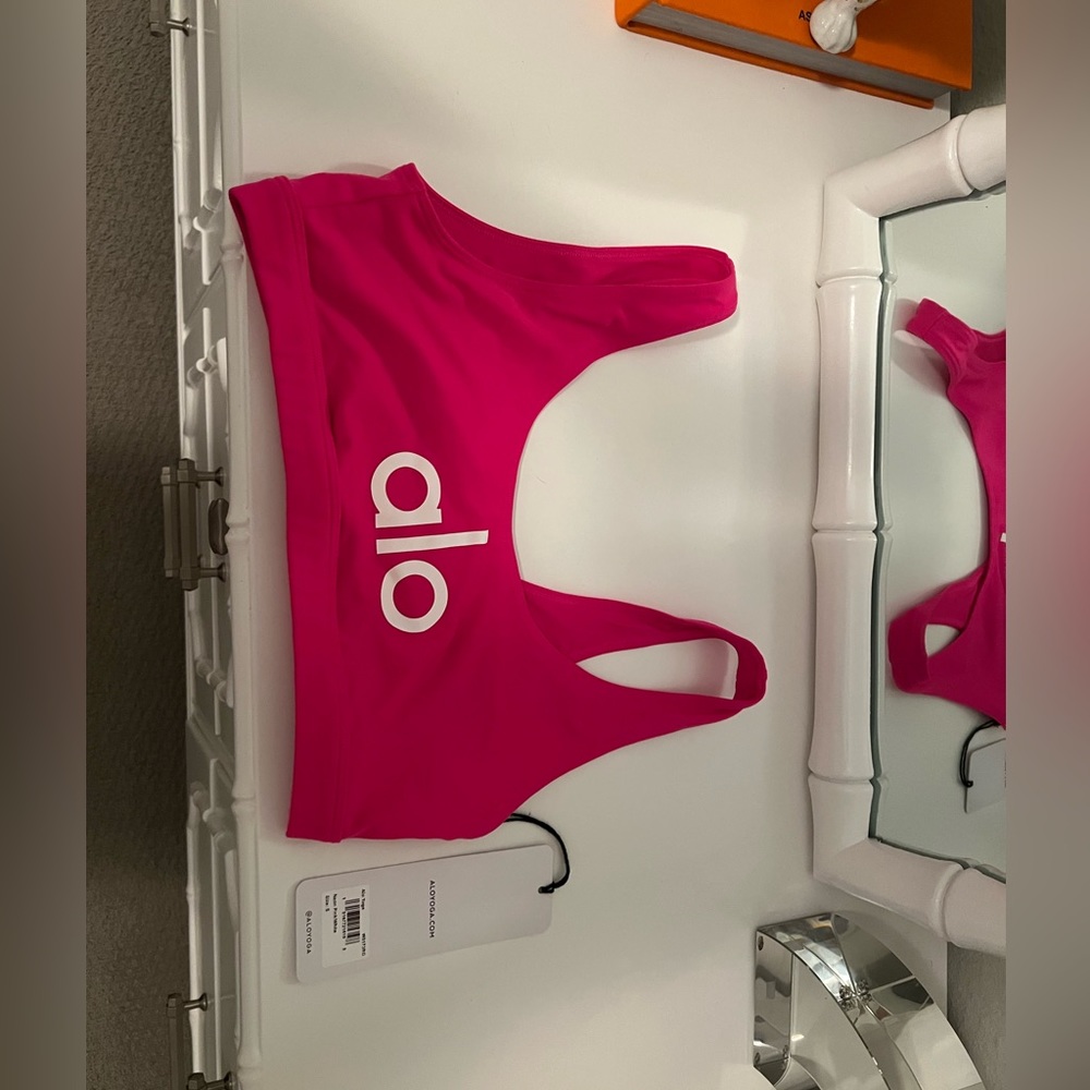 New fuchsia pink Alo sports bra
